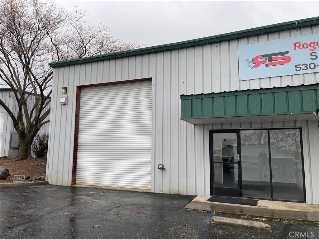 3199 Plummers Dr, Unit 12 is a warehouse located in a busy Industrial Park. It includes a small office, a private bathroom, a small mezzanine storage area, and front and rear roll-ups.