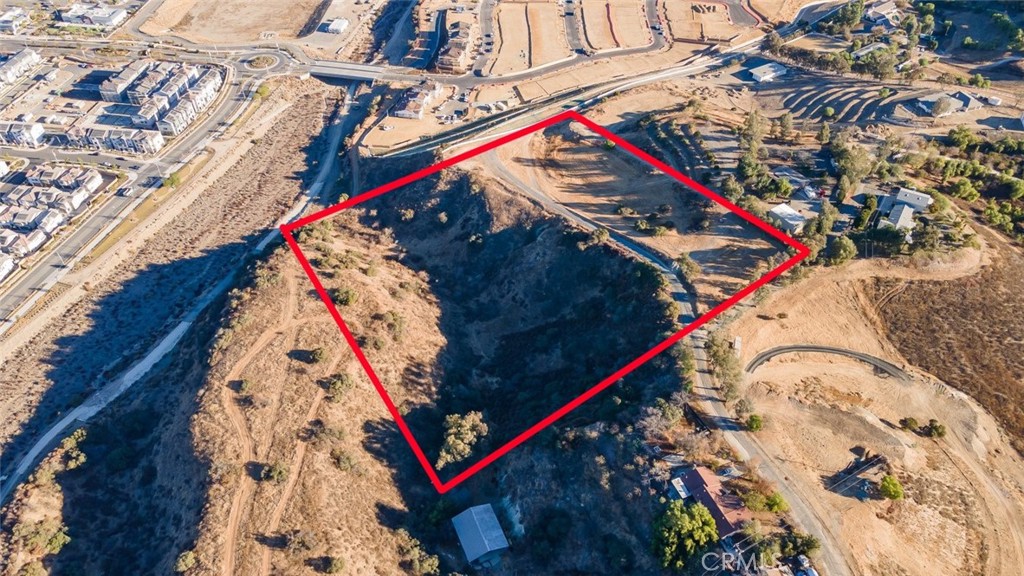 Exceptional Opportunity! This remarkable 10-acre parcel, located off North Weirick Road, offers privacy, natural beauty, and accessibility. Located just outside of Corona, this prime property features breathtaking panoramic views of the mountains and city, and is zoned R-A-5, providing endless potential for custom home development, agricultural use, or a private retreat.
Positioned near the prestigious Dos Lagos shopping center and the vibrant new Bedford community, this lot provides a coveted location. Families will appreciate the proximity to top-rated schools, while outdoor enthusiasts will love the expansive space and potential for equestrian or recreational activities. The property's stunning vistas and ideal location make it a rare find. Whether you're dreaming of building your custom estate or seeking an investment in a rapidly growing area, this land is your blank canvas. Utilities are nearby for ease of development.
This is your chance to own a slice of paradise just outside of Corona! Schedule a visit today to explore the possibilities of this extraordinary 10-acre property.