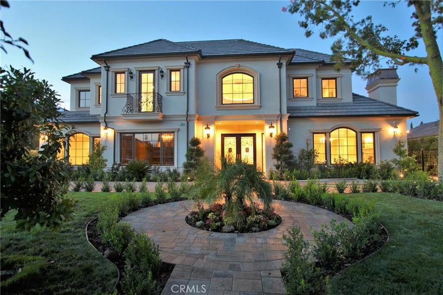Absolutely stunning brand new French Normandy Home with lavish architectural design & constructed w/ the highest quality of materials & finest craftsmanship in Arcadia's Baldwin St. School. The grand double door entrance w/ 25' cathedral ceiling, 6' Crystal Chandeliers, marble Foyer, custom Murals, Domes, & decorations by known artists. The main level of this 6 Luxury Suites home consists of a Living Room, Dining Room, Family Room, Library with Coffer Ceilings, Blue-Ray & 3D Home Theater, Elevator, Wine Cellar, Gourmet Kitchen, Wok Kitchen, Prof Viking Appliances, Breakfst Nook, & 1st Floor's Master Suite. The 2nd floor consists a Gym, 2nd Library/Arcade Room, Loft, Master Suite w/ sitting area, Mini Wet Bar, Walk-in closet, Sauna, & Balcony. The Family Room w/ unique 25' High Ceiling, 7' Crystal Chandeliers, Wet Bar to overlooks the spacious perfectly landscape backyard w/ waterfall pool/spa, 1/2 Basketball Court, & outdoor Patio for family entertainment. Extensive use of Crystal Chandeliers, Italian Marbles, Granite, & Moldings, Hand-painted ceiling, Wood Floor, Security Cameras, Inter-com Sys throughout the house.  Must see to appreciated!