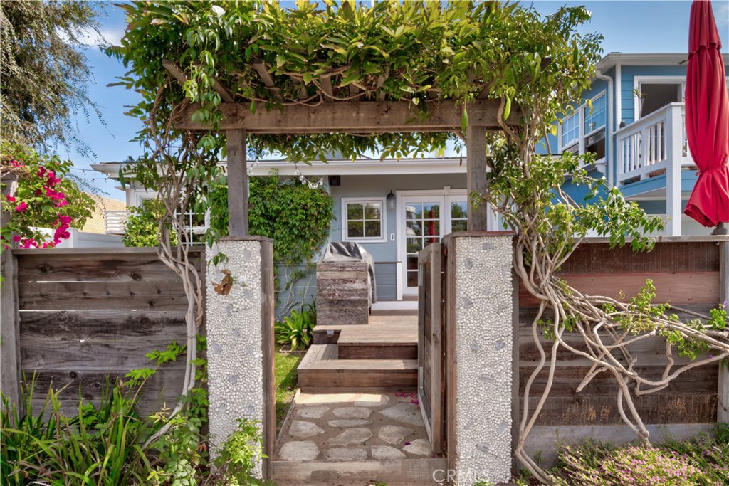 Exquisite 2 bedroom/1.5 bathroom front-unit cottage located in the heart of Corona del Mar village on the ocean side of Pacific Coast Highway. The charming front patio provides privacy from neighbors and ample usable outdoor space as well as a comforting and welcoming entrance. This remodeled, single level home is complete with hardwood flooring, a separate dining room and oversized living room, and additional storage in the private back patio and garage. This is a wonderful opportunity to reside in a highly coveted area, proximal to world renowned beaches, shopping, and restaurants.