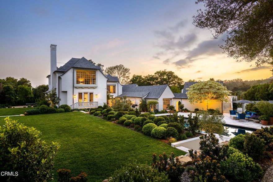 It's not everyday that you come across an estate that perfectly juxtaposes modern boldness and old-world sophistication - vintage meets contemporary.  Modern interpretation of French Country personify this home and the recent high-end refresh by Mike Moser out of M Studio and acclaimed builder Richard Heimberg.  The minute you walk into the gorgeous oval and glass front door, you are met with playful elegance.  With just over 6,500 square feet and 5 bedrooms + 5.5 bathrooms, the main house embodies a collection of special spaces for one to treasure.  The dining room is filled with soft natural light and rich materials, while the living room features vaulted ceilings, a grand fireplace, multiple options for access to outdoor seating and dining, and a custom renovated wet bar for entertaining.  The living room brilliantly mixes color and textures with panache, creating a bold yet inviting central gathering space for the estate. While the grand dining room and living room are perhaps reserved for larger special occasion gatherings, the stunningly renovated chef's kitchen is equipped with Sub Zero and Lacanche' appliances, custom built-in breakfast area, and cozy kitchen living room with beautiful mountain views - for everyday livable luxury.  The upstairs primary bedroom boasts even more majestic mountain views, fireplace, and a beautifully refreshed and reimagined bathroom makeover, including dual walk-in closets and dressing room area.  The upper level of the home also enjoys a chic sitting room, 3 renovated bedrooms and 2 bathrooms with unique tilework and charm.  Main level living quarters feature an additional primary suite, and recently renovated bedrooms and bathrooms.  A Red Cedar lined home gym can be found in the lower level of the home, with bathroom, laundry room, and access out to the grounds and pool area.While the details of the home's interior and decor are striking, what you don't see is equally as impressive.  The property has been renovated and upgraded to every high-end builder's dream. From extensive drainage work and security fencing, to HVAC and electrical upgrades, this property is perfection inside and out.  Meticulously landscaped, this .91 acre property enjoys a sparkling pool with shallow Baja Bench, Tequila Tavern with outdoor seating and firepit area, outdoor kitchen and dining area off the main kitchen, 2 car garage with upstairs 1 bedroom 1 bathroom apartment, and multiple grassy areas.