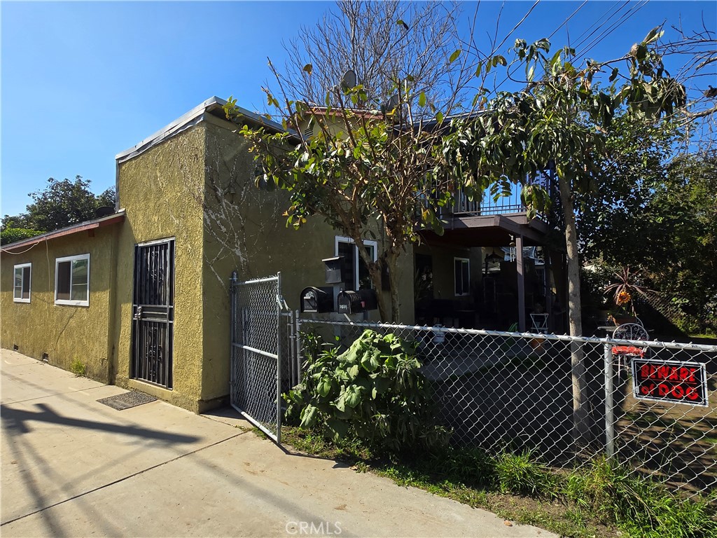 Excellent opportunity to own 2 separate units. The first house features a two story 3 bedroom, 3 bathrooms, living room, kitchen, and laundry room/office, new balcony and new double pane windows. The second home is a single story, features 2 bedrooms, 1 bath, living room, kitchen and laundry area. The third is a studio unit with a restroom and kitchen area (unpermitted).. This property has a variety of fruit trees 6 avocado, 4 orange, 1 pomegranate, 1 banana and 2 guava trees. Property needs TLC Buyers are responsible to conduct their own due diligence with the appropriate state and local agencies, including but not limited to permits, use, and local ordinances. A must see to appreciate, schedule your appointment today!
PROPERTY SOLD AS IS. PLEASE DO NOT DISTURB THE TENANTS.