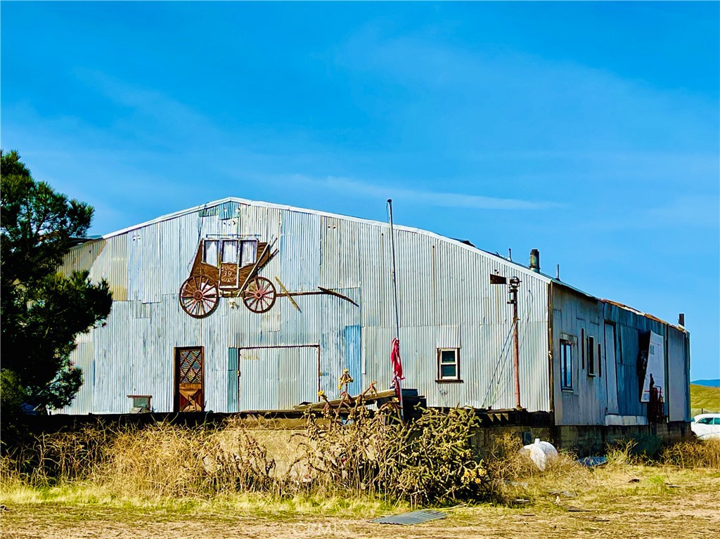 Prime Industrial Opportunity on Highway 138 – 8.36 Acres with 4,800 Sq. Ft. Metal Building
Unlock the potential of this versatile industrial property with high visibility and convenient access along Highway 138 en route to Lancaster and just minutes away from the I-5 in Gorman. Situated on a fully fenced and level 8.36-acre lot, close to other residences and farmland, this site is ideal for light manufacturing or industrial development.
At the center of the property stands a 4,800 sq. ft. metal building, featuring a wood frame and flooring. Though it requires renovation, it offers a solid foundation for customization to meet your specific needs. Power is available at the street, and there’s an existing (but untested) water well on site.
For reference, we’ve included photos that show the interior prior to the current damage to help you visualize its potential.
?? Important Notice: Due to safety concerns, building entry is not permitted. The structure will need restoration.
This is a rare opportunity to secure industrial-zoned land in a fast-developing corridor with excellent access and promising potential. Don’t let it pass you by—schedule your showing today!