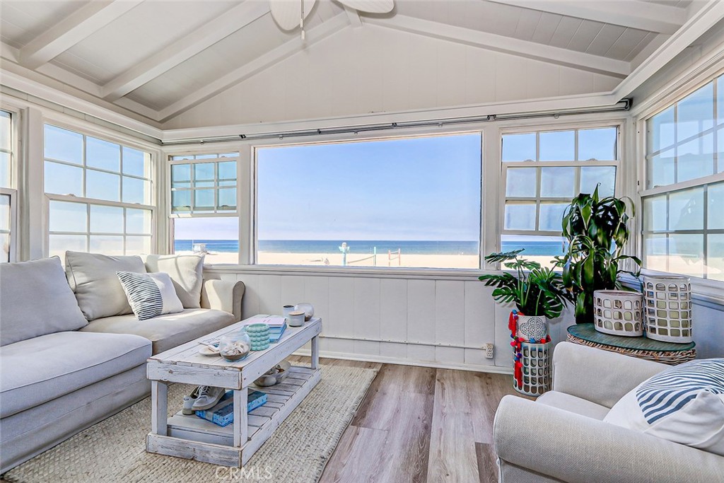 Have you always dreamed of building a home (or second home) on The Strand, only to watch prices drift higher and higher? Well, here is the opportunity to experience oceanfront living just a comfortable walk from the Pier and downtown, at a price that may surprise you. Imagine watching Pro Volleyball from your balcony, as you sip your favorite beverage- watching sailboats and surfers, dolphins and more, at sunset in the orange glow of days’ end. And on a balmy autumn afternoon, whitewater washing the shore in the final glint of daylight as you stare one more time looking for the green flash of the sun as it dips below the horizon. God ain’t making any more ocean front property here. The existing structure is a 1913 dwelling with 4 bedrooms. This is in the 30 foot height area of The Strand, making for three floors on grade, and better top floor views, as well as a roof deck! This location, just north of the Pier, is ideal due to the walkability to restaurants. Yet, still far enough away to stay quiet at night. It’s a unique life at the beach, and you deserve it!