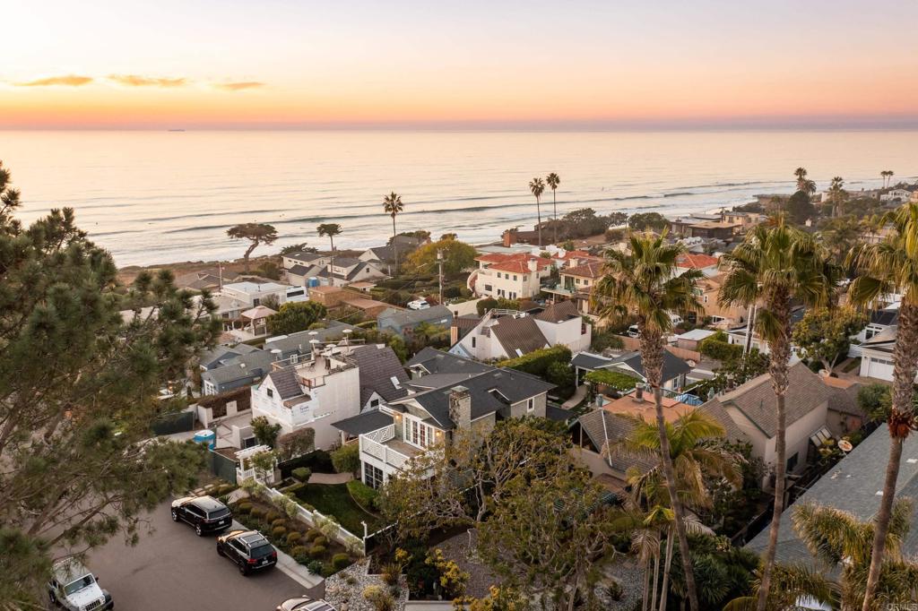 This quintessential Del Mar home located in the Village is custom built and designed with superior craftsmanship, high-end finishes, and effortlessly timeless materials by the renowned architectural firm of Bokal and Sneed. The home is approx 4437sqft on an approx 8006sqft lot situated from 10th St. to garage access on Penny Lane, 5 bedrooms, 7 bathrooms, office space, multi-level family/living rooms and sleeping quarters, master-retreat with ocean views and private patio, white picket fence encloses the front yard garden, al fresco dining, outdoor living room with fireplace under a heated veranda, outdoor kitchen area in the large, lush and green backyard. The custom gourmet kitchen is equipped with high-end appliances and marble counters opening up to the eat-in kitchen as wells as the great room. Ideally located West of Stratford Court, only steps away from beaches, shops, restaurants, and the acclaimed Del Mar Community Center.