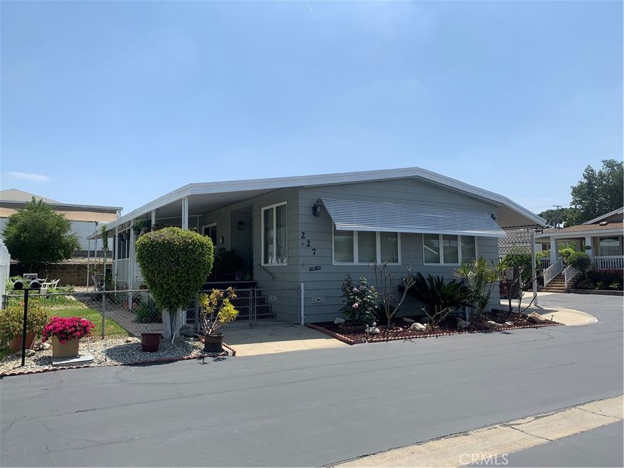 BEAUTIFUL VERY WELL MAINTAINED COMMUNITY OF CIENEGA VALLEY ESTATES IN THE CITY OF SAN DIMAS.  THIS IS THE OPPORTUNITY TO OWN YOUR OWN HOME IN THIS VERY DESIRABLE, GATED COMMUNITY.  COMMUNITY HAS LOTS OF WONDERFUL AMENITIES AND FUNCTIONS THAT ALLOW EVERYONE TO ENJOY.  THIS HOME HAS TWO BEDROOMS, TWO BATHS WITH A BONUS ROOM THAT CAN BE USED AS AN OFFICE OR A CRAFTS ROOM OVER LOOKING THE PORCH AND SIDE YARD, BIG OPEN PORCH TO RELAX DURING THE SUMMER TIME.  THIS HOME HAS A VERY AIRY, OPEN FLOOR PLAN WITH LIVING ROOM, DINING ROOM, VERY OPEN KITCHEN WITH AN ISLAND, A NICE BIG WINE BAR WITH LOTS OF SPACE FOR ENTERTAINMENT, SEPERATE LAUNDRY AREA, NICE BIG SIDE YARD WITH A VEGETABLE GARDEN AND FRUIT TREES, PRIVATE BBQ AREA, TWO CAR COVERED CARPORTS AND BEAUTIFLY LANDSCAPE.  MUST SEE TO APPRECIATE!!!