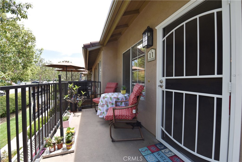 Location, Location Location!! Beautifully upgraded upper unit in the Mission Courts II Community. This charming condo features 2 bedrooms and 2 baths and has been Totally upgraded inside! Upgraded features to include new laminate flooring, newly painted. Gorgeous new quartz kitchen counter tops, newly finished kitchen cabinets and hardware, all new stainless steel appliances, new vanities in both master and guest baths, new finish pro coating in master and guest tubs, and much more have to see. Views of Saddleback Mountains and located directly across the street to Lago Santa Margarita Beach Club and Lake Rancho Santa Margarita enjoy a walk around the lake or the pool and picnic areas for your enjoyment. Conveniently located near the 241 toll road, shopping, and schools. This property is in move in condition!! Seller is motivated and will consider "All Reasonable Offers"