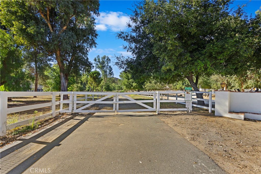 One of the very few FLAT & USABLE parcels still available for development in La Cresta! Nestled amongst the mature oak & eucalyptus trees and multi-million dollar estates, this flag lot parcel of land offers peace, tranquility and privacy. Parcels like this one are few and far between and this one is priced to sell. This 5-acre lot is beautiful for so many reasons, including the St. Galen Trail that runs through for easy horse trail access & mountain VIEWS! It has a gated entry set back from Calle De Lobo and is fully fenced. Utilities are very close with a home in front of this lot for ease of building. And, most importantly, especially for the Equestrians, it is FLAT AND 100% USABLE! This is a rare opportunity to own and build your dream estate on a flat, quiet parcel on the Santa Rosa Plateau. Discover the La Cresta Lifestyle: 5-acre minimum parcels, friendly neighbors, star-filled skies, partake in equestrian activities & community events & raise animals – all just minutes from the conveniences of being in town. The Santa Rosa Plateau offers it all with trails to take walks, breathe clean air, and hike/ride miles of trails via the robust private recreational trail system & the thousands of acres of the Ecological Reserve. All less than 1.5 hours from LA, San Diego, OC, Palm Springs & Big Bear. Discover the country, yet convenient, lifestyle of La Cresta!