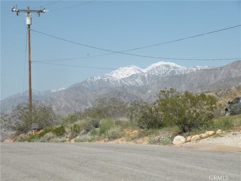 Photo of 54595 Navajo Trail Trl, Yucca Valley, CA 92284 (MLS # AR24255987)
