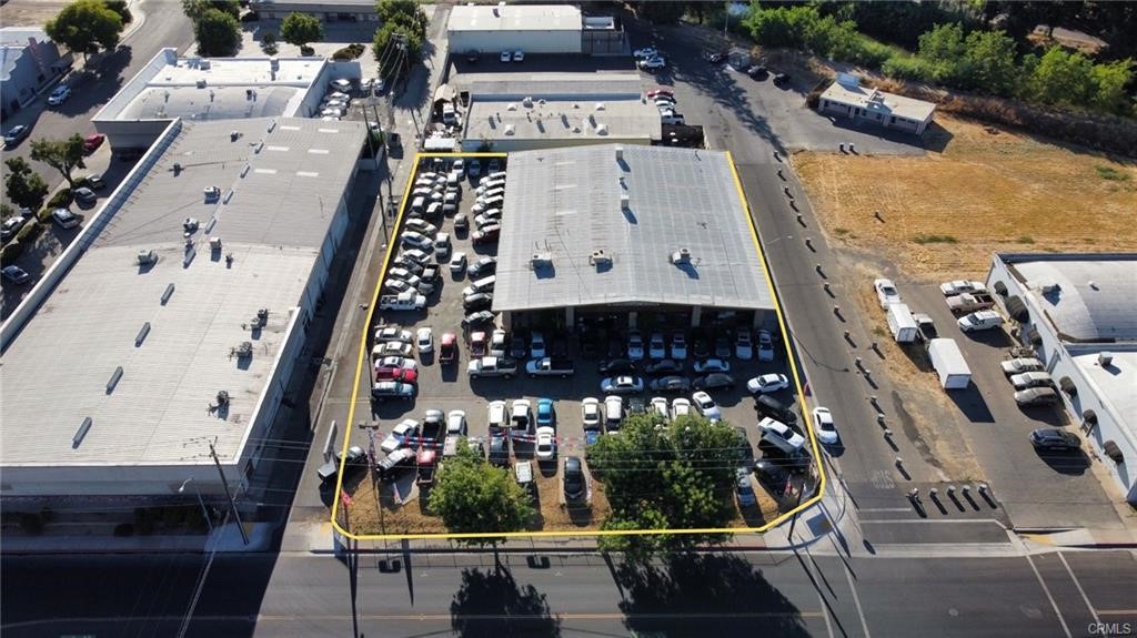 Excellent opportunity to own both an automotive dealership and service center! This 15,000 +/- sqft commercial lot is the ultimate location for your business in downtown Merced. The front of the property includes a large showroom, with 3 separate offices. The back service center features two 14x14' roll-up doors and a third 8x8' roll-up door with an additional storage room, allowing for easy vehicle access and allows you to tailor the space to your specific needs. The property includes a mezzanine that could be used for additional office space or storage. Located in the heart of downtown Merced, you’ll be at the center of it all with easy access to major highways and transportation routes. This thriving area is home to numerous businesses and continues to grow rapidly.