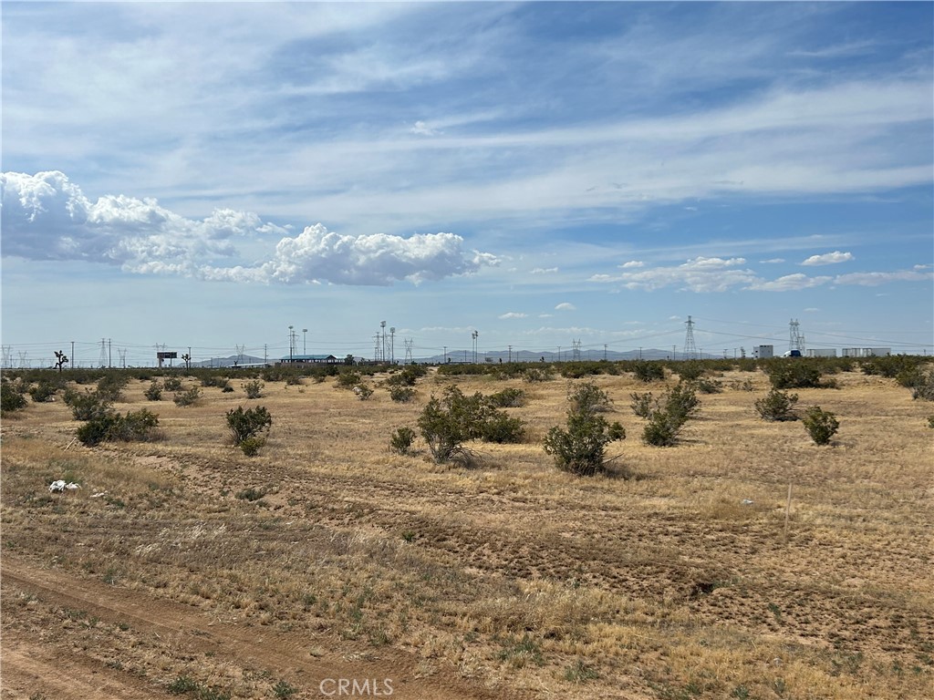 APN 0463-441-14. Strategic 10-acre lot near Dale Evans Pky. and Quarry Rd. Located in the active North Apple Valley Industrial Specific Plan (NAVISP). Tremendous amount of activity in the area recently, including a 75 acre assemblage near the Walmart D.C. Prices of industrial properties in the Mojave River Valley have dramatically increased recently. This property is priced to sell, so don’t miss out. The proposed Brightline train to Vegas will be built 1.25 miles from this site