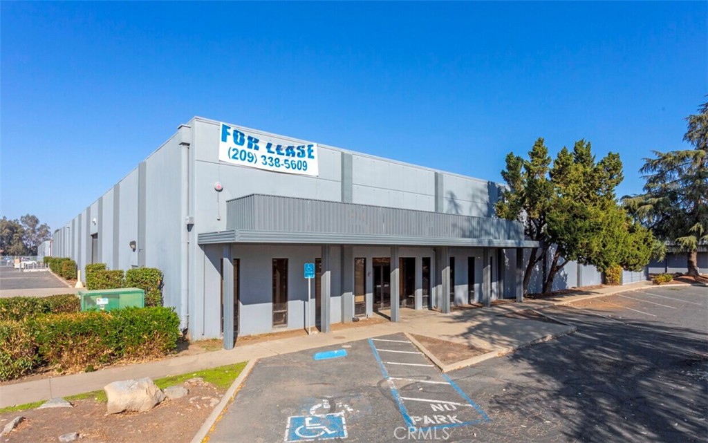 This is an industrial building in a strategic location. Strategically positioned just 1 mile from Freeway 99, accessibility is a key feature, facilitating seamless transportation and distribution for your business. With two Drive-in Bays and an ample 38 parking spaces, logistical efficiency is prioritized, ensuring smooth operations for tenants.