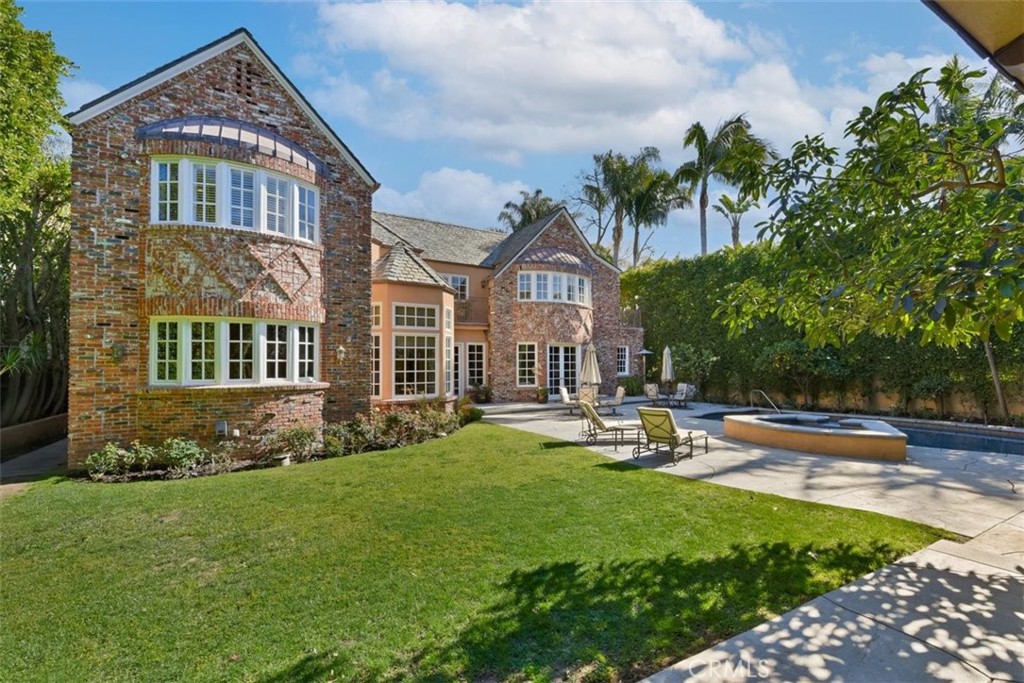 This stunning custom built 6,195 square feet (per assessor) home opens to a beautiful grand foyer. First floor boasts a stunning formal living room, office/library, den, bar, formal dining, gourmet kitchen, breakfast area, walk in wine cellar, laundry room with ample storage and a ensuite bedroom. Two fireplaces with custom stone work and wood floors. All dining, kitchen and den open to the backyard oasis. Surrounded by lush landscaping, pool, spa, 1/2 bath and private bbq area. A entertainers delight. Take the elevator or the grand stair case to the second floor. With five rooms upstairs. Three large ensuite bedrooms, one office/bedroom with ensuite bath. Master suite has two terraces, fireplace, high ceilings with wood beams, private sitting area. Take the private hall down to one of the two master baths. Designer Sherle Wagner fixtures/hardware. Custom wood work though out entire house. This home has ample parking with a gated entrance, two car garage, and circular driveway. State of art camera security system. Walkability to stores, restaurants and trails.
Appraised June 2021 for 8,400,000