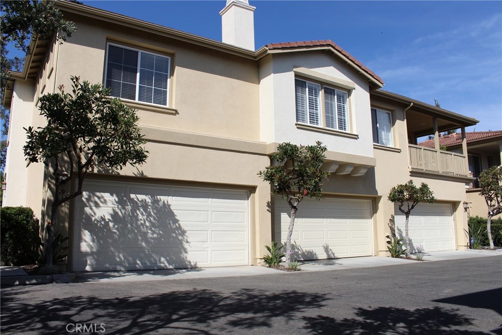 Upgraded Private end unit in the Gated Community of Greystone Villas of Northwood Point. The condo sits at the end of the street providing a private entry. This highly upgraded 2 bedroom and 2 bathroom unit has all living area on 2nd level and only garage on main level. This home features an open living area with a media niche and fireplace. Laminated wood floor, wood shutters and designer paint throughout. The kitchen is open to living and dining area with walk in pantry and separate laundry room next to it. Kitchen has been beautifully remodeled with white cabinets, granite counter tops, designer tile backsplash and new stainless steel appliances. The master suite has a large walk in closet and the bathroom has been upgraded with a granite vanity top. The large balcony is accessible from the bedroom or dining room and is large enough to entertain your family and friends. The two car attached garage has been upgraded with an epoxy floor and custom storage and is located below the unit with direct access to interior of the house. The community is within walking distance from award winning Canyon view elementary school and Northwood High School. Association amenities include pools/spa/ BBQ, tennis court, parks, and walking trails.