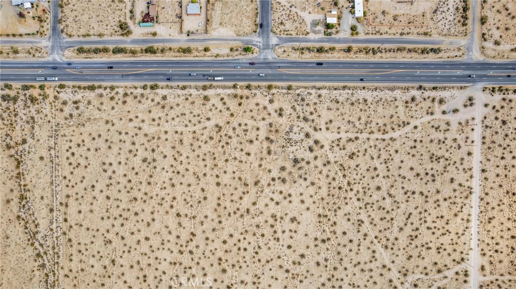 Growing area of the desert, close to Joshua Tree National Park. Property is adjacent to hwy.