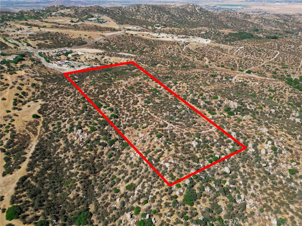 19.6 Acres of Land. This Great property in the Hills of Nuevo has much to offer. It is bordered north of the Ranches of Sky Mesa Community. There is plenty of room to build a custom home, or mobile home. This property offers great views and privacy for your family. It is a must see with lots of potential. This is Lot 12.