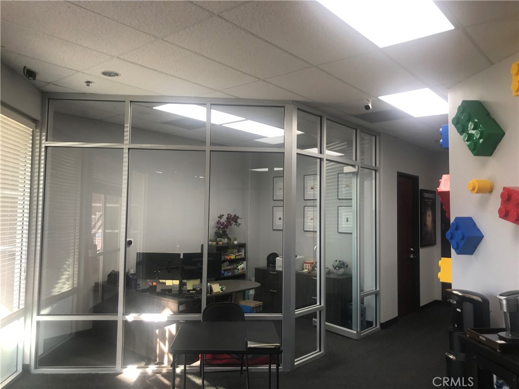 Space shows very well. Modern colors and timeless features. Six private offices along the perimeter of the space, One large private corner office with room for meeting table and desk, large open bullpen with room for up to seven stations, two glass conference rooms, open work area with counter space and storage, reception area in the foyer.
