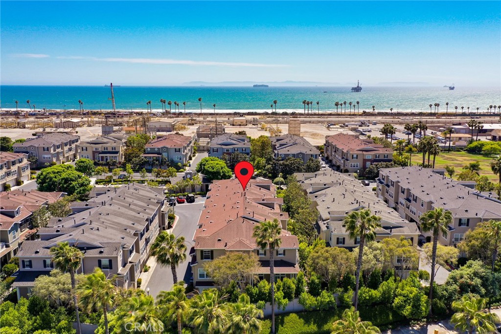 Incredible Location + Prestigious Neighborhood = VERY HAPPY LIFE!!! You can't ask for a more prestigious neighborhood and location in Huntington Beach than 24 hour guard-gated Mystic Pointe in Boardwalk. This 1,933 sqft. 3 bedroom + 2.5 bath luxury townhome is just steps to the sands of Surf City USA. You're going to love the ocean breezes and open floor plan that features high volume ceilings, recessed lights, and picturesque windows offering lots of light and room to enjoy the ultimate lifestyle you deserve. The kitchen boasts an abundance of white cabinetry, granite counters & island, and stainless steel GE Profile appliances + Viking gas cooktop! The Owner has just installed brand new carpeting! Additional upgrades include laminate flooring, plantation shutters, and ceiling fan. The huge master suite offers lots of natural light, large walk-in closet w/built-in closet organizer system, and grand ensuite bathroom w/dual sinks, separate spa tub, and tiled walk-in shower. The additional 2 spacious bedrooms have very large closets and share a clean bathroom w/dual sinks and tiled tub/shower. The upstairs laundry room comes with a full size washer and dryer. Enjoy great afternoons at the beautiful pool & spa which is ideally situated just steps from your front door. This home comes with free high speed Internet, basic cable, water, and trash services. This lifestyle can't be beat with Seacliff Country Club's (private club) golf and tennis amenities right across the street, and just a quick walk, jog, or bike ride to Downtown Main Street's shops, restaurants, bars, pier, and ocean. The Owner will consider a maximum of 1 pet.