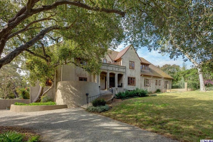 A once-in-a-lifetime Opportunity!!!! This spectacular Country English manor was designed by prominent architects Hunt & Burns in 1923 for Standish & Barbara Mitchell. Mr Mitchell was an executive with the Automobile club of Southern California, president of the Coliseum Commission, & played an instrumental role in the development of our modern freeway system. Architects Hunt & Burns designed many prominent buildings,estates & country clubs in Los Angeles & Pasadena, including the Doheny Mansion on Chester Place, the Los Angeles Automobile Club & the Southwest Museum. The home has had only 3 owners in 94 years. The spectacular 2.4 acre property (consisting of 3 parcels) is located on a desired block & is one of the larger estates in Flintridge.Set behind gates & hedges, the home is privately sited away from the street. The gracious house has character details & a wonderful floor plan. All rooms have beautiful views & an abundance of natural light. The Estate played a major role in the original In-Laws (1979) movie & scenes for The House Bunny and The Good German were shot there also.