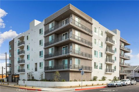Photo of 11714 Archwood Street #406, North Hollywood, CA 91606 (MLS # SR25066521)