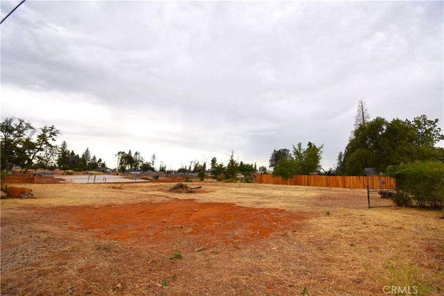 Are you looking for a nice lot in a great neighborhood in Paradise to build your new dream home?  This property at just over a quarter of an acre may be the one for you!  This lot is flat and east facing overlooking the West Branch of the Feather River Canyon making for beautiful views of the morning sunrises! Prior to the Camp Fire there was a 3 bedroom, 1 bathroom home on the property.  A septic system remains in place and public water through PID is available. Some beautiful new homes have been built and are currently being built in the area. Don't miss this opportunity to be a part of the rebuilding of the beautiful town of Paradise!