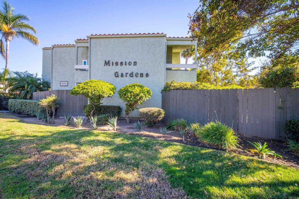 Move-In Ready Condo with Modern Upgrades and Prime Location. This condo offers comfort, convenience, and privacy. Recently upgraded with new flooring, a remodeled kitchen and newer down stairs flooring. Upstairs features two large bedrooms, each with high ceilings and private balconies. Enjoy in-unit laundry, water included in HOA fees, and a designated carport with extra storage right across from the unit. Outdoor spaces include a fenced side yard, back patio, and a trail with mature fruit trees. Community amenities in Mission Gardens include a pool, rec room, and open green spaces. Situated near downtown Chula Vista and major freeways, this condo is part of an area benefiting from a significant city investment, including the Chula Vista Bayfront Master Plan with new parks, open spaces, and future retail and dining options.
