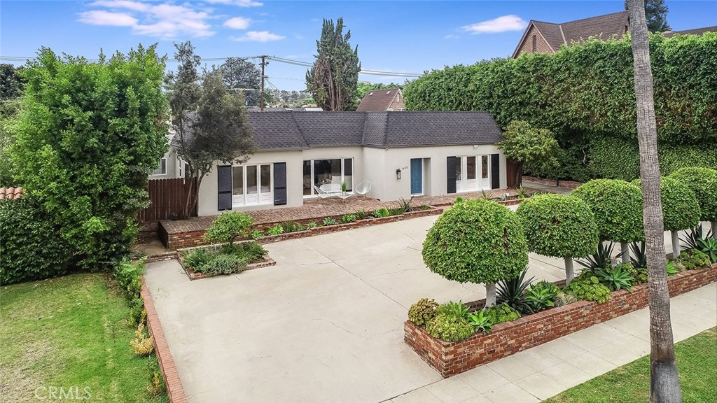 RARE OPPORTUNITY TO OWN PROPERTY IN THE FLATS. HOMEOWNERS – DREAMHOME BUILDERS – INVESTORS – DEVELOPERS. Beautifully remodeled, exceptionally livable, one story home with heated pool. Large 14,455 sq ft lot, north end of the 600 block, and on the preferred west side of the street. Walking distance to Rodeo Drive, world class shopping, renowned restaurants, and wonderful places of worship. Almost 11,000 sq ft new home possible per zoning. Current home is rare one story, level floors, full laundry room, double garage, spacious yard with heated pool. Gourmet kitchen, maid’s quarters with separate entrance if needed. Spacious living, dining, and family rooms. Security system with cameras. Electric car charging station. See this wonderful home in person and be impressed! CLICK ON THE VIRTUAL TOUR VIDEO. Easy showing, make appointment.