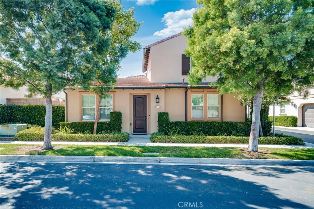 Rare corner lot single family home in Portola Spring, this is a 1928 sq. ft.2 story single family home with 4 bedrooms and 3 bathrooms.2 bedrooms on the first floor, the master suite features an large walk-in closet and a separate bathtub in the spa-like master bathroom. Then the other bedroom with a separate bathroom, good for guests or elders.The loft upstair is a perfect place for a home office, and this home is light filled with lots of windows. The windows together, combined into L-shaped formation throughout the loft.The home has recently been completely upgraded with hardwood floors downstairs and upstairs, brown cabinets and window dividers throughout, granite/quartz countertops, large single basin sink.Outside community sport facilities: Enjoy resort style amenities including hiking and biking trails, a newly constructed 32 acre sports park, three tennis courts, two light ball courts, two light soccer fields, six light ball courts, three lighted tennis courts, and a beach volleyball court and children's playground.It only takes 5 minutes to drive to Woodbury/Foothill Ranch Town Center, 11 minutes to Spectrum/Market Place shopping. Quick access to 241 and 133 toll roads.The school district is highly ranked, especially Portola High School, which is rated 10 and is loved by parents and students.