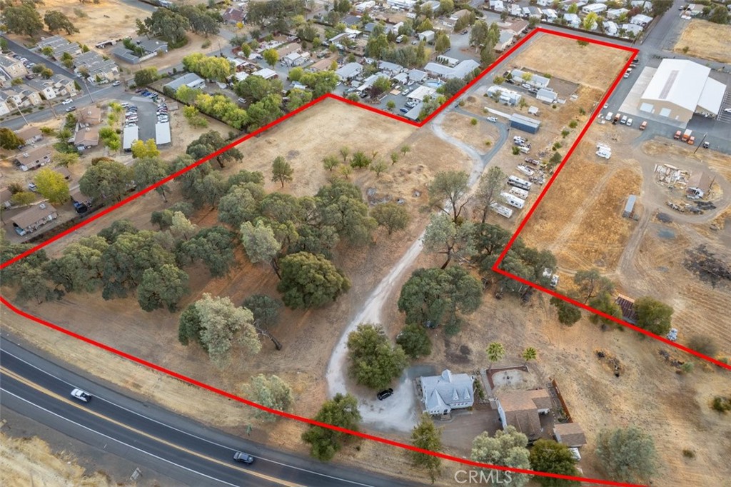 This special property consists of 2 separate contiguous parcels located on Hwy 29, just a few minutes from Historic Downtown Kelseyville. The parcels are being sold together to capitalize on the overall development potential. Parcel (1) 5880 Live Oak (also listed under Residential Income) is a beautiful oak-studded 6.07 ac parcel, zoned PDC-DR consisting of a 1558 s.f. charming vintage home with 3bd/1 1/2ba, a basement and 1100 s.f. detached garage with 3/4ba and a 192 s.f. sound room. Parcel (2) 5860 Live Oak is a 2.7 ac parcel, zoned R2 Medium Density consisting of a 1680 s.f. manufactured home with 3 bd/2ba and a 720 s.f. mobile home with 2 bd/2ba, Utilities, water and sewer are in the street.