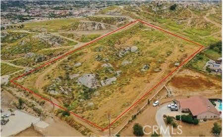 Elevated view lot in Woodcrest surrounded by custom homes. Prime Location! Space for multiple building pads, each with panoramic views.