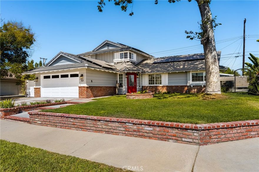 Welcome to 763 N Elmwood Street, your dream home in the heart of Orange, California! This stunning two-story residence offers 5 spacious bedrooms and 3 luxurious bathrooms, perfect for families of all sizes. Nestled on an oversized corner lot, this highly updated home features an open floor plan designed for seamless living and entertaining.

As you enter, you'll be greeted by designer flooring throughout and a modern kitchen equipped with top-of-the-line stainless steel appliances, including dual wine refrigerators. The main floor boasts an oversized master retreat, providing a serene escape with ample space for relaxation.

The backyard is an entertainer's paradise, featuring a sparkling pool, relaxing spa, and a custom-built outdoor cooking and BBQ area. Gather around the gas firepit on cool evenings, creating the perfect ambiance for outdoor gatherings.

This home also includes PAID FOR SOLAR, ensuring energy efficiency and significant savings on your electricity bills. Located just minutes from top shopping destinations, diverse dining options, and Chapman University, with easy freeway access, this home combines luxury with convenience.

Don’t miss the chance to own this exceptional property in one of Orange's most sought-after neighborhoods at 763 N Elmwood Street!