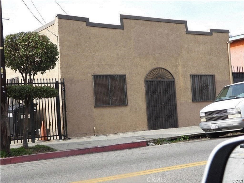 This is an outstanding Free Standing Building located on a very busy street in Los Angeles. The building could be used for multiple purposes like: Daycare center, Convalescents Home, Warehouse, Private School, Retail Store, Laundry Machine Business light manufacturing, or a good opportunity for your builder, these are TWO lots and could easily build several residential units, up to 12 UNITS, on both lots. The property consist of TWO parcels, one parcel number is 6011-002-031 with 5,111 lot Size and 3,780 Sq. Ft. Building; second parcel is 6011-002-032 with 5,112 Sq. Ft. Lot and 480 Sq. Ft. house with garage included. Adding a Total of 10.223 Sq. Ft. Lot with plenty parking and 4,260 Sq. Ft. Construction total! The main building has a newer roof, Woman Restroom with 3 toilets. a handicap bathroom and restroom for men with TWO toilets and TWO urinal places. The main building counts with FOUR AC units, adding a total of 13 tons. Nice inside, very clean and ready to be used. The other unit has three bedrooms and ONE bath house which could be rented.