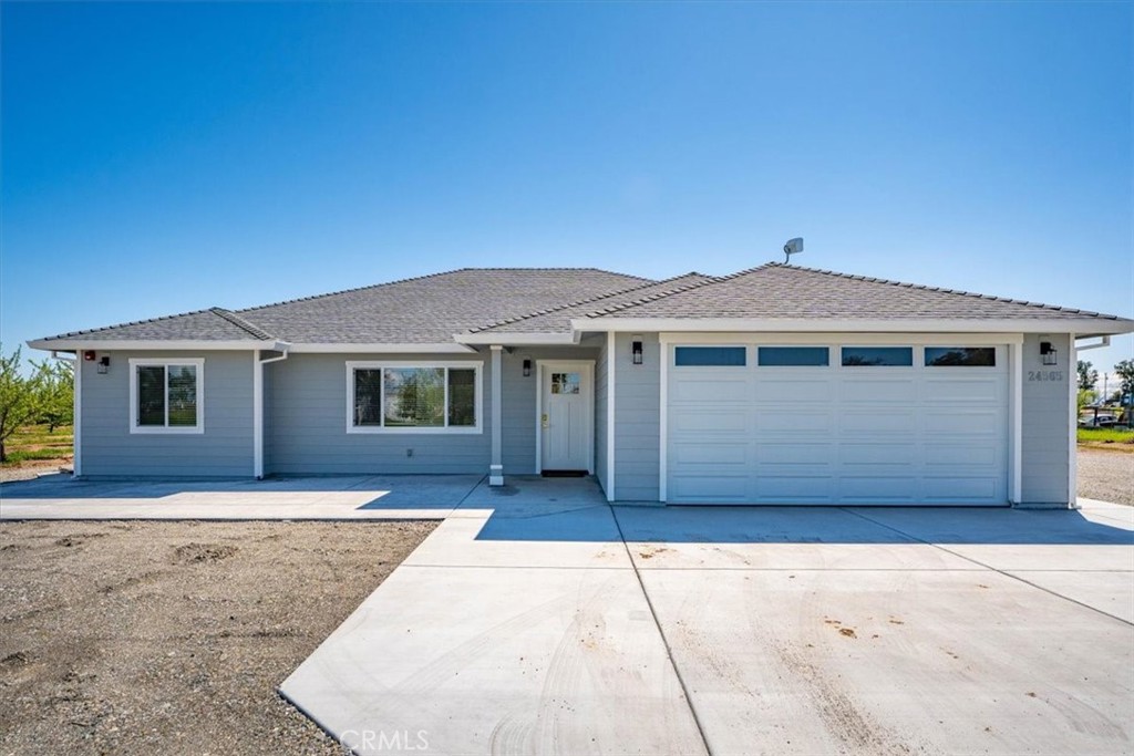 Welcome to this 2025-built 3 bedroom, 2 bathroom home featuring a desirable split floor plan and modern finishes throughout. The
spacious kitchen boasts sleek quartz countertops, soft-close cabinetry, and stainless steel appliances—perfect for entertaining or
everyday living. Durable vinyl plank flooring flows through the home, combining style with functionality. Enjoy outdoor living on the large
covered patio, ideal for relaxing evenings or weekend gatherings. The property includes an almond orchard and is supported by an
agricultural well, offering great potential for hobby farming or income production. A two-car attached garage adds convenience to this
peaceful country setting. Don’t miss your chance to own this turn-key property with acreage and charm!