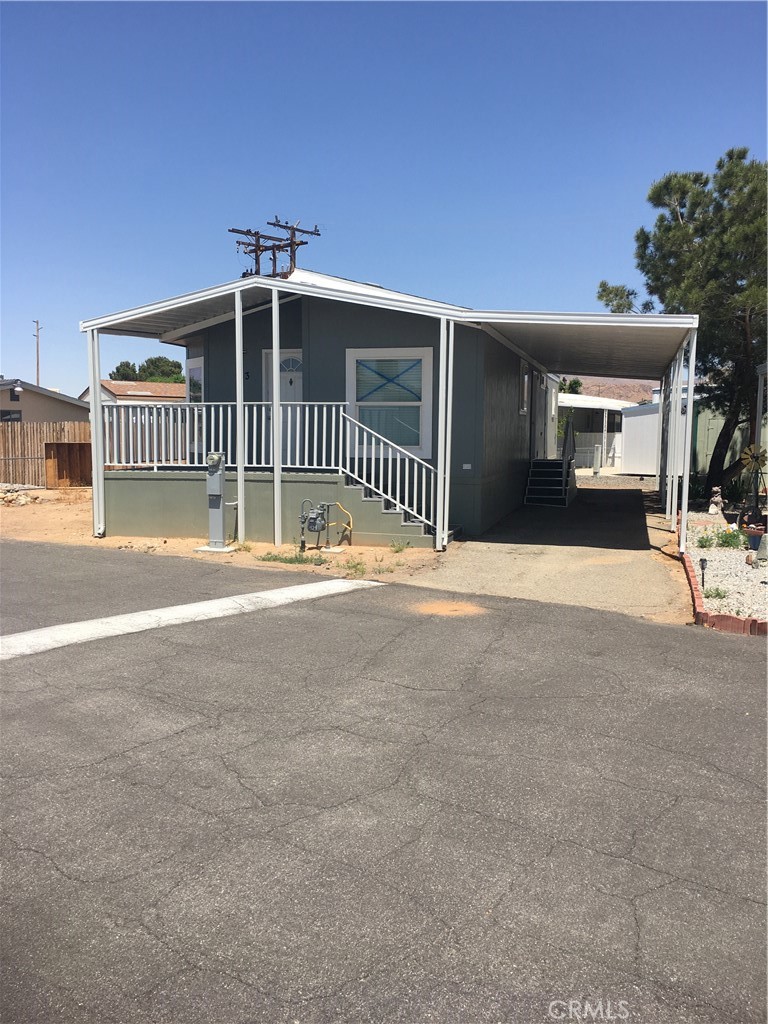 Clean, nicely refurbished mobile home for sale in beautiful, quiet park. This double wide mobile home has 2 bedrooms and 2 bathrooms, two car carport, front patio and deck. $128,000.00 cash with monthly space rent of $745.00 Park amenities include laundry facilities, pool, and clubhouse.