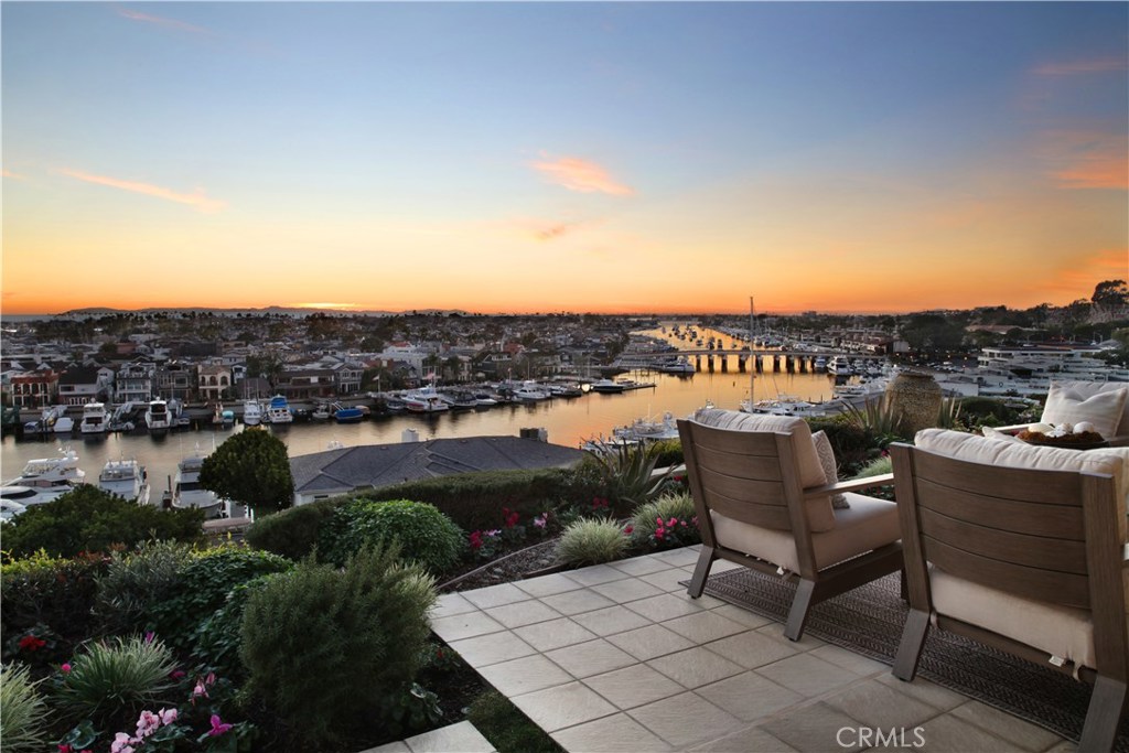 MAJOR PRICE REDUCTION! TO SEE A VIRTUAL TOUR OF THIS PROPERTY PLEASE VISIT https://vimeo.com/387816703 .
Ideally positioned on a generous 90 foot wide lot in a premium location on Dolphin Terrace, this single story comfortably casual and chic, soft contemporary home features completely unobstructed, seemingly endless panoramic views! Appealing to the Buyer who is not looking for a mega-mansion to live in yet priced to appeal to someone who may want to consider the property for its future development potential, this special home with outdoor spaces you might find in a botanical garden setting, is ideal for entertaining. The home’s open floor plan with clean architectural lines is awash with an abundance of natural light provided by expansive floor to ceiling walls of glass and skylights. The residence features three bedrooms, three baths, a media room or den and an oversized three car garage. Designed by Fari in the early 1990s, spacious rooms, high ceilings and an indoor/outdoor lifestyle merge in a timeless and classic design for optimal style and flow. Located in the heart of Newport Beach, the location is walking distance to shopping and dining at Fashion Island, CDM village, Balboa Island, the Back Bay Dunes recreational area, the Newport Beach Country Club and Irvine Terrace Park. John Wayne Airport and freeway access are conveniently close. This is a truly special home and opportunity in a wonderful location on the quiet end of Dolphin Terrace.