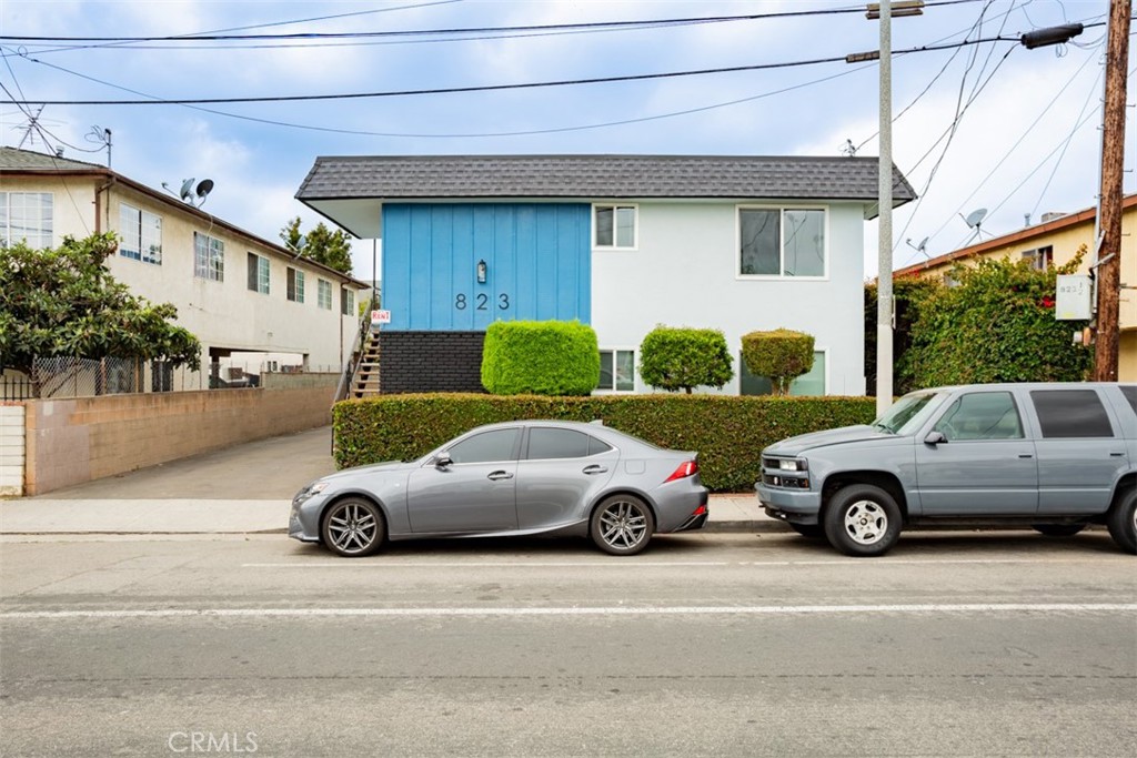 We are proud to present The Sapphire Crest, a stunning 2-story, 7-unit multifamily investment property located at 823 Lagoon Ave. Wilmington, CA. This garden-style apartment building boasts curb appeal, totals ±5,301 building square feet on a ±7,512 square foot lot, and is zoned LARD1.5.
The property was built in 1965 and tastefully renovated in 2023, including a remodel of all interior units, a new roof, windows, and drought-tolerant landscaping. In addition, all the electrical sub-panels are new and recently installed in May 2024. The unit mix is comprised of 4 one-bedroom/one-bath units, 1 two-bedroom/two-bath unit, and 2 two-bedroom/one and one half-bath townhome-style units. These well-appointed apartment units include wall A/C units, new flooring, kitchens, bathrooms, and plenty of cabinet and storage space. In addition, drawings have been completed for an ADU comprised of 1 two-bedroom/two-bath unit totaling ±760 square feet. The building construction is comprised of a wood frame and stucco exterior with brick accents, a flat roof, and a freshly painted exterior. The property is separately metered for gas & electricity. Building amenities include laundry room and garage parking for 7 cars on-site via 2 two-car garages and 3 one-car garages.
This investment opportunity presents an ideal turnkey, high-income-producing asset with stabilized rents, a 6.81% cap rate, and attractive day-one cash flow—perfect for an investor seeking a low-maintenance, stabilized asset. The Seller is highly motivated, making this a compelling opportunity to secure a strong-performing property with potential for negotiation and value.
Aesthetically, the property gushes with pride of ownership and charm and offers some of the nicest apartment rentals in Wilmington for a few lucky tenants to be proud to call their home.
The Sapphire Crest is ideally located in a desirable residential community of Wilmington within Los Angeles County, offering residents easy access to a host of amenities and nearby cities. Situated near cities like Long Beach, San Pedro, Carson, Torrance, and Lakewood, this property benefits from a convenient location within proximity to various shopping centers, restaurants, entertainment venues, and recreational facilities. The building is a short-distance drive to the 110 and 1 Freeways. It is a roughly 15-minute drive to Long Beach Harbor and the Queen Mary.