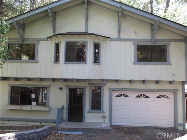 Beautiful mountain home situated among the trees and near a seasonal stream in the rear yard. Inside has beautiful wood cabinets and cozy fireplace in the living room. Home boasts 3 bedrooms, 2.5 baths and a loft area. You have level entry into the downstairs that has a living room , dining area, half bath & a full kitchen. Step outside the kitchen eating area onto your rear deck. Home is lovely and waiting for the right buyer. This is a Fannie Mae HomePath property. Association Amenities: None # of RV Spaces: 0 Special Features: LFNONE Lot Location Type: Standard Location Landscaping: Natural # of Attached Spaces: 2 # of Detached Spaces: 0