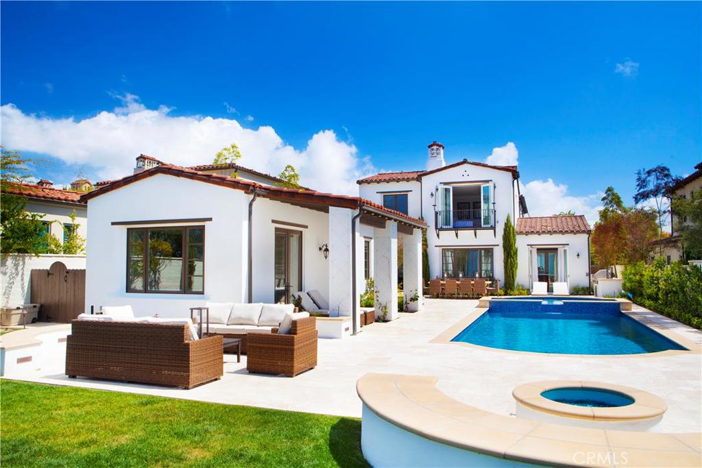 In a setting that recalls the Mediterranean allure of Majorca, this pristine home overlooks the shoreline, the ocean and Catalina Island beyond. Occupying one of the largest ocean view parcels in the community – at more than 1/3 acre – this spacious, light and exquisitely finished residence within Crystal Cove’s gated Nautilus enclave offers a rare configuration that includes two master suites, two additional bedrooms, five baths, plus a detached casita with its own living room, bedroom suite and kitchenette. Refined details include sculptural archways, deep crown moldings and baseboards, wainscoting and gleaming wood floors. The great room’s ocean vistas and fireplace invite gatherings. The adjoining kitchen is equipped with Viking and Sub-Zero appliances. Upstairs, the master suite enjoys sea breezes through French doors. Outside, a mosaic-edged pool, spa and limestone terrace underscore a European ambiance. A fireplace, built-in barbecue, fire pit and spacious lawn make the most of the enviable climate. Crystal Cove residents enjoy use of the Canyon Club, as well as nearby private parks. Some of the finest dining and shopping in California, as well as the renowned Pelican Hill golf course and miles of picturesque beaches, are moments away.