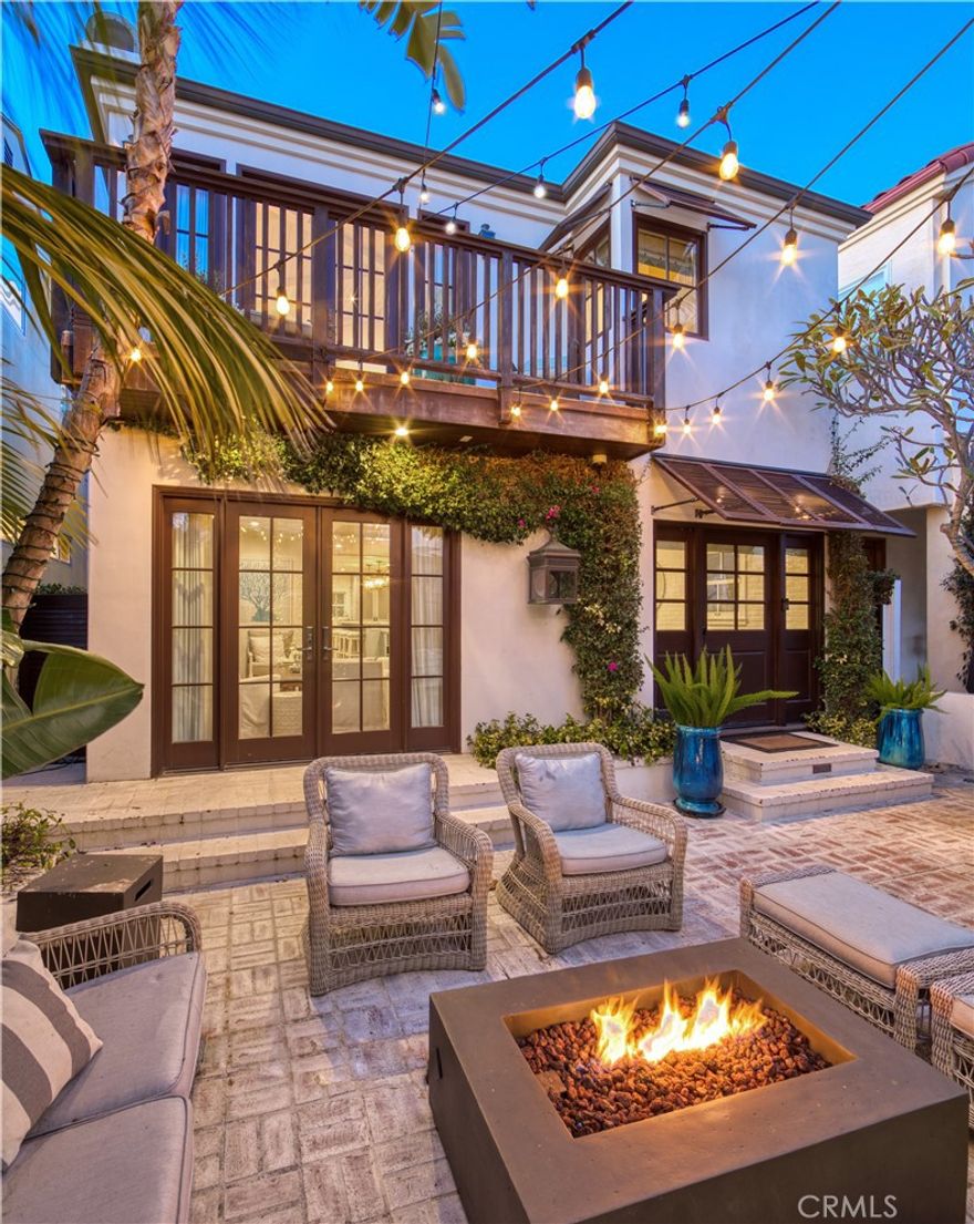 It’s time to live your best life!  A coastal gem designed with family in mind, this decorator perfect home is situated mid-block on the best flat walkstreet in all of Manhattan Beach.  This home has space for everyone, featuring SIX exquisite bedrooms, bonus media room and an office with lounge area.  The gorgeous primary suite has tons of natural light, a large walk-in closet fit for a queen and a custom primary bath with handmade tiles. The gourmet kitchen is a dream with Sub-Zero fridge and freezer towers that frame a commercial grade Wolf range, Calcutta Gold countertops, Paul Ferrante custom island pendants, icebox latch pulls, prep sink, wine fridge and a banquette table with built-in seating for 8.  Other features of this gorgeous home include a pinterest-worthy laundry room with butler’s staging area and folding room, dual zoned A/C, a spa-like outdoor shower and a large mudroom with tons of storage adjacent to a back patio with a private outdoor dining area and BBQ.  Striking the perfect balance between indoor and outdoor living, the front patio flows from the living room and has plenty of space to lounge and entertain, complete with fire pit, outdoor TV and dining table for 10.  As an added bonus, most of the furniture and decor can be included!  Perfectly situated just 3 blocks to the beach and 2 blocks to all of the fabulous shops and restaurants in downtown Manhattan Beach, don't let this one get away!
