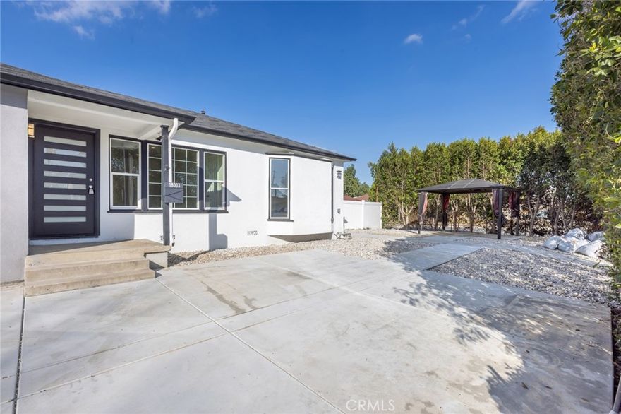 Nestled in the heart of Encino, this completely remodeled 3 bedroom 2 bathroom residence invites you into a realm of modern elegance.  You'll be greeted with an abundance of natural light throughout the home, wide plank vinyl flooring, recessed lighting and a gourmet kitchen that's a culinary haven with stainless steel appliances and quartz countertops. This property also includes a brand new washer and dryer for added convenience.  Unwind and rejuvenate in the seclusion of your own tree lined private backyard, conveniently located on a corner lot.  Situated blocks away from Lake Balboa Park and Woodley Golf Course, and offers easy access to the 101 freeway.  Your new home awaits in this charming Encino neighborhood.