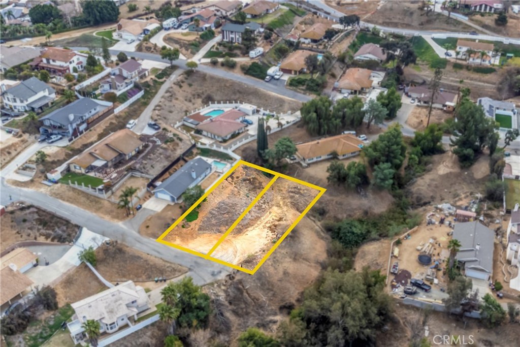 Two lots at end of a cul-de-sac with beautiful panoramic views. Build your own home in the privately located community of Canyon Ridge. Nice established neighborhood set in the hills of Riverside. Power and water at street. (Google Latitude 33.882386, Longitude -117.414662) Note: Address is just for posting purposes and not the actual address.