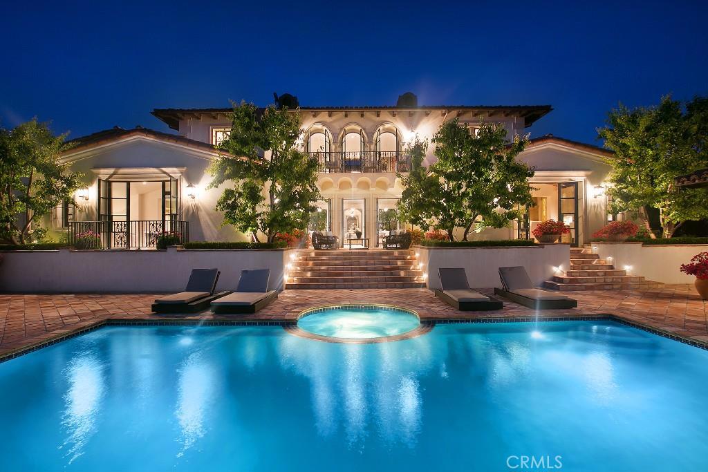 Newly refreshed & fully furnished, this exquisite Mediterranean-inspired estate in famed Crystal Cove is beautifully positioned on a prime lot, offering dramatic views of the ocean, Catalina Island, Newport Harbor & coastline. The authenticity, quality & artistry of the home's design lend to a sophisticated yet relaxing atmosphere. Indoor & outdoor entertaining spaces seamlessly flow with a romantic center courtyard serving as the heart of the home. Uniquely, this custom residence offers 2 master bedroom suites both with generous closet space, one of which is on the main level, offering flexibility & opportunity for multi-generational living. The home features an elegant interplay between formal & informal living spaces, & offers notable highlights including a generous office/library, state-of-the-art theater with tiered seating, climate controlled wine room with 210-bottle display & 72-case storage, home gym & spacious game room. Outdoors, an infinity pool, spa & pavilion offers the perfect venue from which to enjoy serene views & gorgeous sunsets. Whole-house smart home technology and a 6-8 car subterranean garage complete this exemplary home. Residents enjoy 24/7 security, access to The Canyon Club, close proximity to Crystal Cove Promenade & beaches.