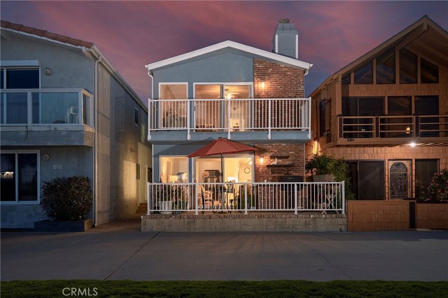 Nestled in the sought-after ‘Old Town’ district of idyllic Seal Beach, this delightful property presents a rare opportunity to live on revered Seal Way, just moments from the deep sand beach, and overlooking the sparkling, wide ocean inlet. Floor-to-ceiling windows enhance the generous living spaces with an abundance of natural light and captivating waterfront views. The three-bedroom home, all with ensuite baths, is spacious, and versatile office space affords the potential for a fourth-bedroom conversion. A selection of accommodating elements includes a remodeled kitchen with modern finishes, Sub-Zero refrigeration, and Wolf appliances; a primary retreat with a fireplace, walk-in wardrobe, and panoramic ocean views; and indoor garage space for three vehicles with another designated space behind the home. A scenic location with optimal proximity to exceptional regional amenities – an extraordinary opportunity to enjoy a coveted coastal lifestyle.