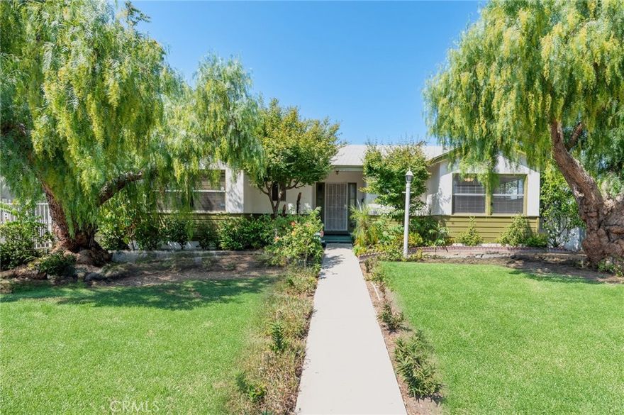 Welcome Home !

As you walk into your living room with amazing large windows adjacent to your formal dining area you know your HOME!

The kitchen adjacent to the dining room has Granite counter tops, tile floor and room for a breakfast table. Beyond the kitchen you will find the large indoor laundry room with plenty of storage. Upon entering the home you will have 1 bedroom with a large closet and ceiling fans and a full  bath to your left. Upon entering the home to your right you will walk down the hall to two bedrooms with ceiling fans, large closets and one more full bathroom. We believe the entire house has hardwood floors as you will see in the bedroom .Newer copper plumbing, ceiling's have a texture (no popcorn )VERY QUAINT HOME. Step out onto your huge covered patio plenty of room for BBQ-ing entertaining or relaxing, play ball with the kids in the backyard. Step down to your detached two car garage ( ADU potential )This home offers a lot of potential for a family, extended family or additional income.. buyers dreams are endless.