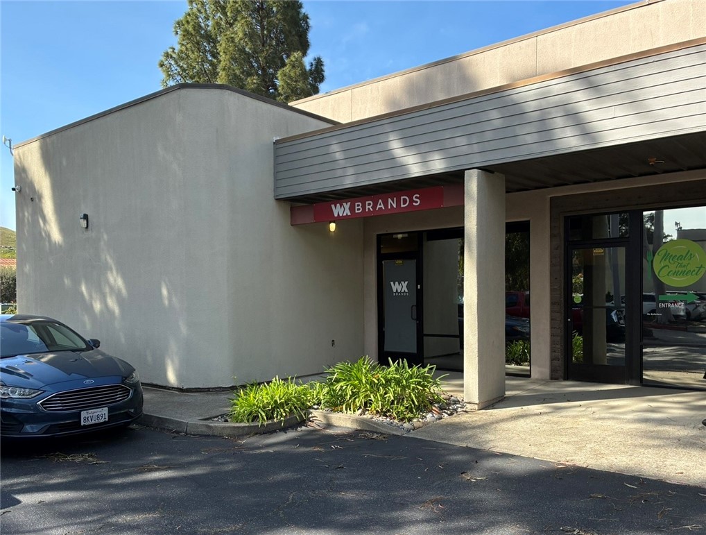 Three private offices, a large conference room, a break area, an open work area, and two restrooms.