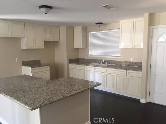 Recently remodeled, commuter friendly home with pride in workmanship evident throughout. Beautiful Antique White kitchen cabinets, granite countertops, new fixtures throughout, beautiful flooring, paint from floor to ceiling, new interior and closet doors, window coverings on all windows, completely remodeled bathrooms with full tile surround, new toilets, vanity, fixtures, mirrors, new copper pipes in the showers, finished garage, all on a large lot with mature trees in the front and RV parking... The list goes on and the attention to detail is evident throughout. Exterior paint includes Premium Sealant on all trim to help ensure longevity. Come view this move in ready home today. Association Amenities: None # of RV Spaces: 0 Special Features: ,NONE Lot Location Type: Standard Location Special Features: Garage Door Opener, Underground Util: # of Attached Spaces: 2 # of Detached Spaces: 0