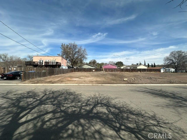 Ready to build on this level residential lot. Located in a residential neighborhood with homes that have been well maintained. Close to downtown Clearlake, shops, restaurants, parks, public transportation and the Lake. Water and sewer are at the newly paved street in front. The assessor's office has this parcel as Pearl Street, but it is Pearl Avenue. One of only a handful of lots in this area.