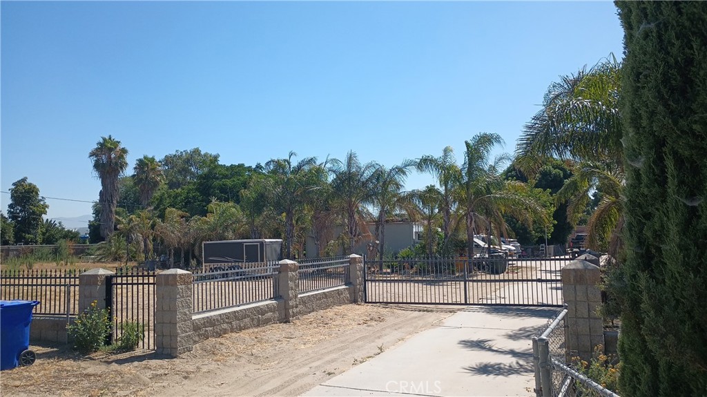 EXCITING OPPORTUNITY, SELLER IS HIGHLY MOTIVATED PRICE REDUCED $600,000 MUST SELL. All offers received will be taken seriously
Build next to a new beautiful church on this flat lot on the path of development 47,920 sq. ft. near I-10, I-60, I-210, I-215 and I-15 FWYS This property is located across Amazon warehouse/distribution center in Fontana. Great opportunity for developers. SFR structure. Sold AS IS. There is a small shop and small storage space next to the garage. Sold for land value, as is in its present condition. Seller open to reasonable offers.