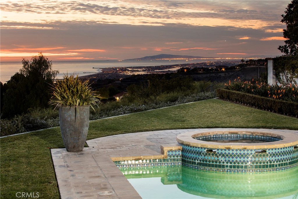 ATTENTION POTENTIAL NEW HOME PROJECT BUYERS!!! This incredible freshly redone contemporary masterpiece is everything you can wish for. With uninterrupted Beach, Bay, city lights and Pacific Ocean views all the way to Palos Verde, this end of cul-de-sac location is completely gated and situated on a half acre lot. The home features the finest of finishes all done in a fresh modern feel. A few of the features include: 3 Sub-Zero refrigerators plus two pull out drawer refrigerators, climate controlled wine closet for storage for 1,200 bottles. All new appliances including wolf range, double dishwashers, two washer two dryer laundry room and two built in Meile coffee makers. This 4 bedroom (all en-suite) 5 full bath 1 powder room mini estate also offers two secondary bedrooms suites upstairs both with walk-in closets and a full gym with sauna attached to the master suite that could easily be the fifth bedroom. The spacious master suite with gym has sitting area, two generous closets and spectacular views up the coast. Rooms on the view include: Living room, dining room, kitchen, breakfast area family room, conversation area, master bedroom, sitting area, master bath and gym.
This home is offered fully furnished.