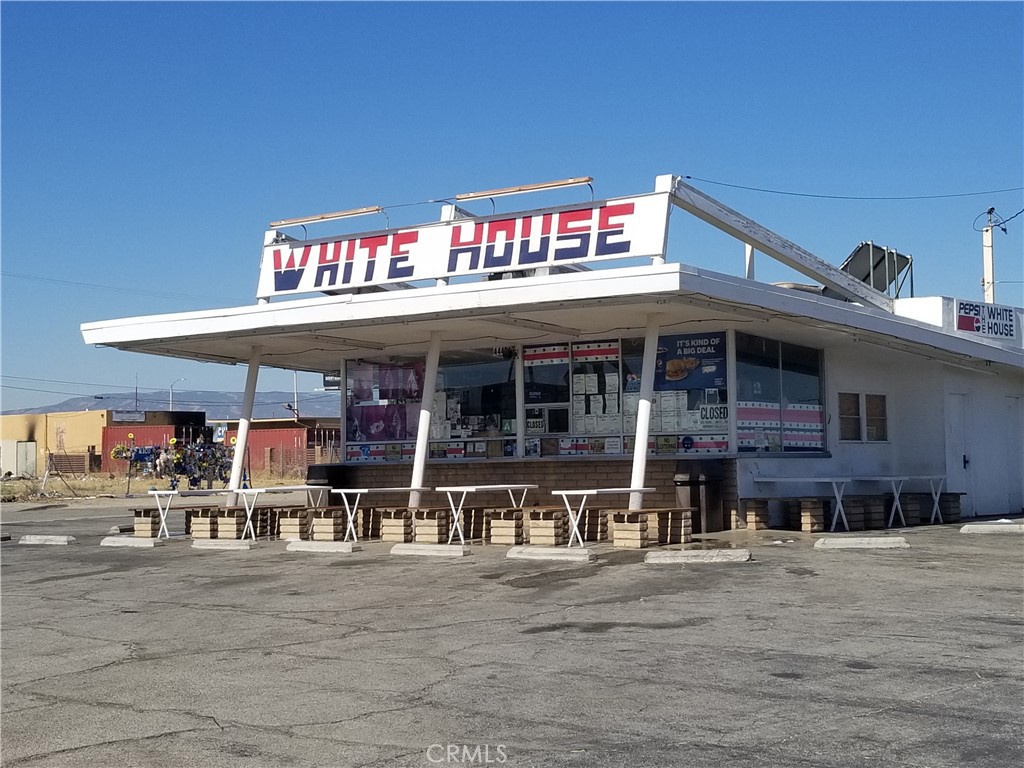 Commercial Building and Land For Sale. Currently operating as the White House Drive-In in Lancaster, CA. This Commercial Building and Land is located on Division St and Pondera St, just North of Avenue J, in Lancaster, CA. The current business, White House Drive In, has been happily serving customers of the Antelope Valley for almost 50 years. This commercial property is currently leased short term. Commercial property is located within one of the City of Lancaster, CA Opportunity Zone. This free standing Commercial Property has several commercial uses and could easily be modified for your own use. Some possible end uses could be converted into a drive-thru restaurant, drive-thru coffee shop, quick serve dairy, bar/tavern/cocktail lounge, retail store front, office space or many other end uses. You could put up a fence around the property and use the property for a variety of business ideas. Excellent corner lot with great visibility. Nice paved lot with ample parking on property and street.